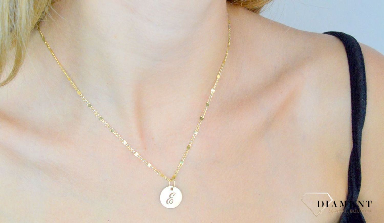 Złota zawieszka 585 literka E ZA 2128E.jpg